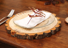 Load image into Gallery viewer, Gorgeous handcrafted solid wood modern live edge bark charger. Made in the U.S.A. these chargers are very classy and elegant. Sure to be a conversation piece in any home or cabin. Use these chargers to place plates on to complete your dining table. Not only do they look beautiful but they offer protection from water, food, heat and moisture that could potentially ruin the finish on a table or other piece of furniture.