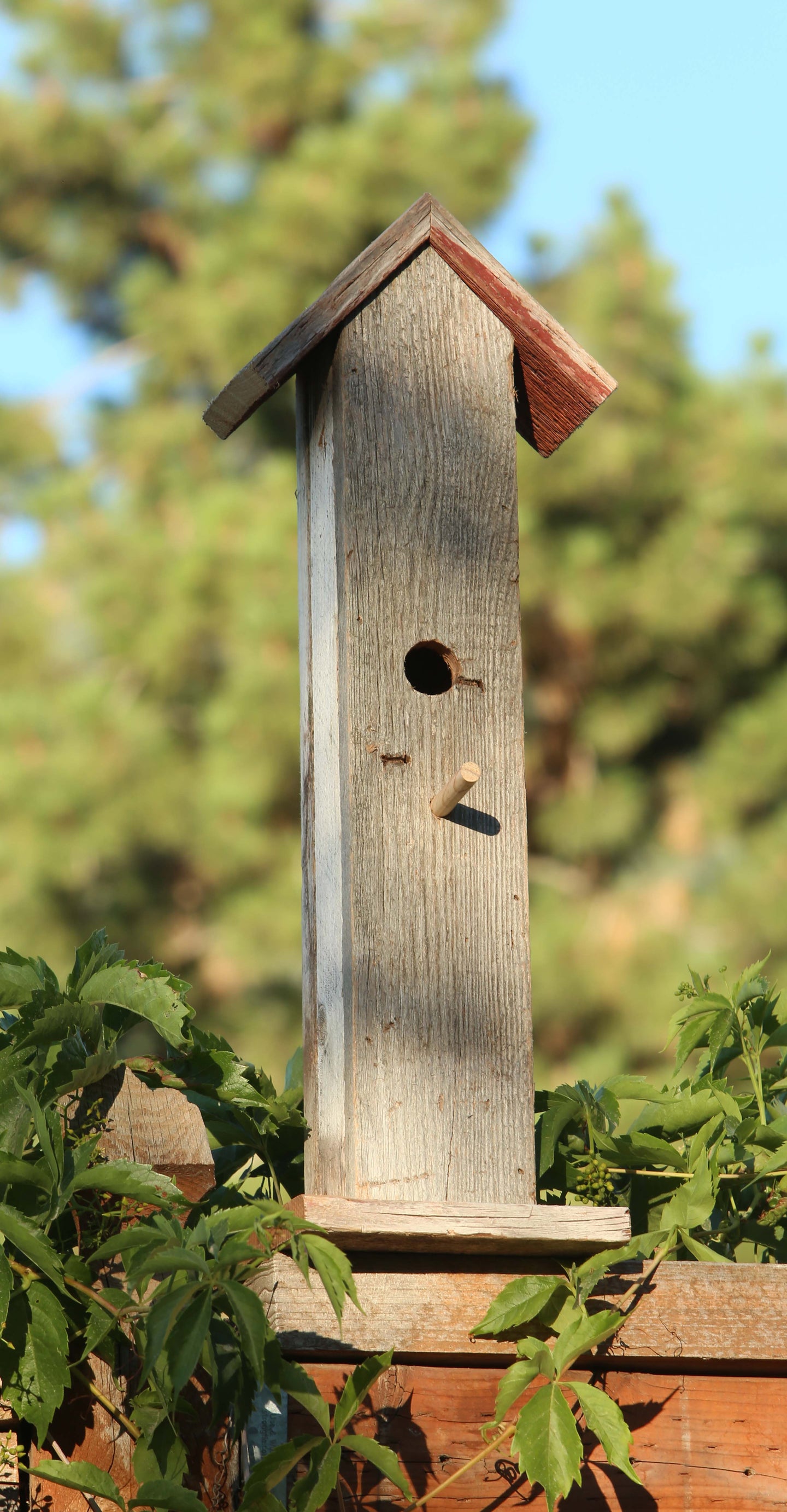 Handcrafted rustic reclaimed barnwood bird house, this birdhouse is made from barn wood