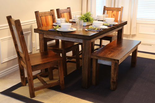 Gorgeous handcrafted dark solid wood modern rustic dining table, bench and chairs. Made in the U.S.A. from re-claimed barn wood. Very classy and comfortable.